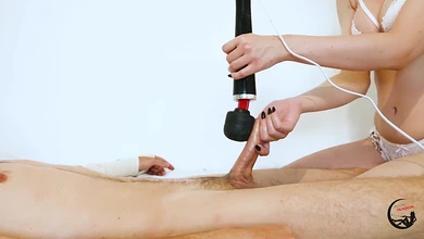 Раб спустя месяц освобождается от клетки на члене, получая дрочку и ласки вибратором по головке от госпожи